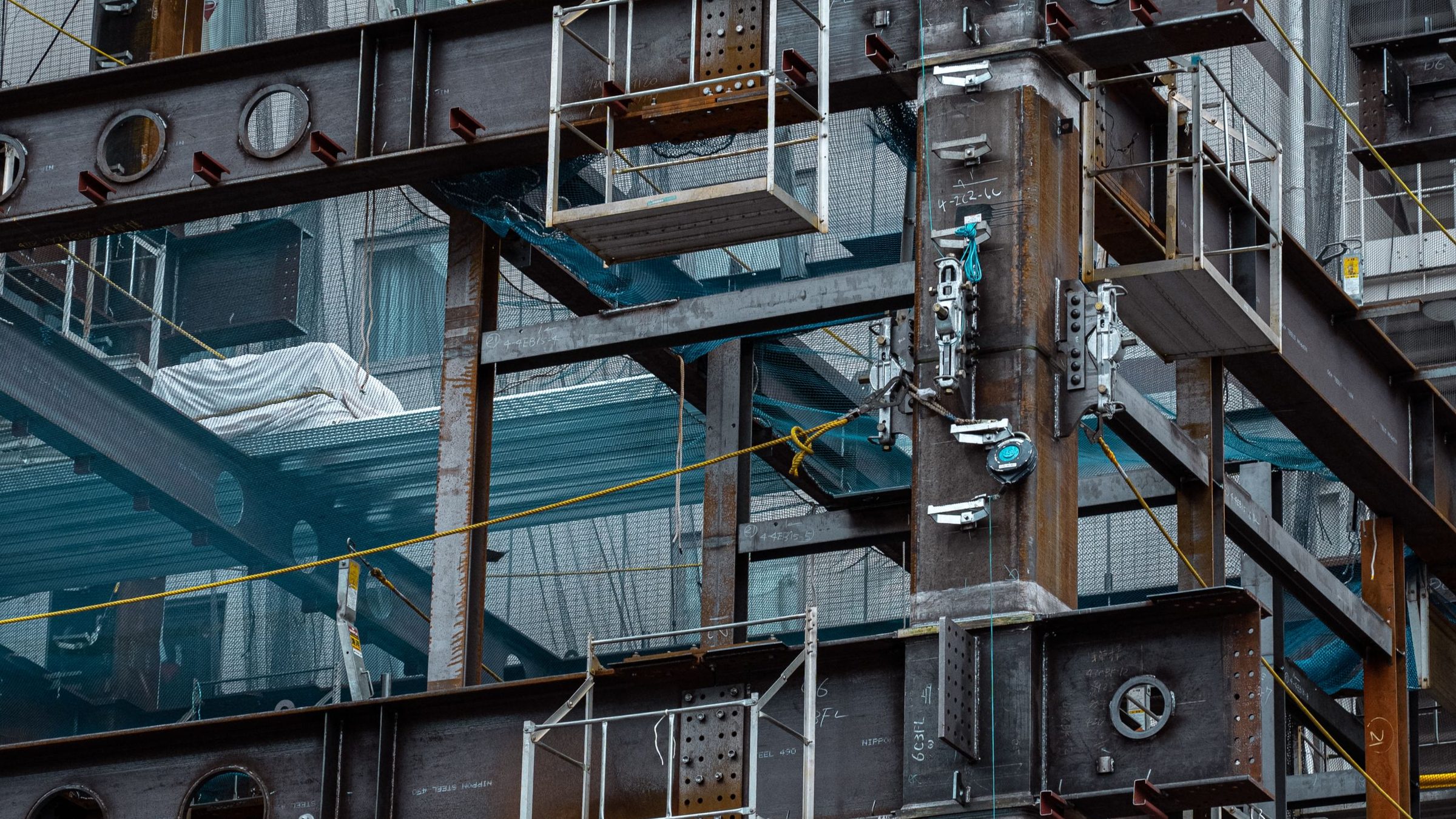 Structural steel framing going up on an active construction jobsite